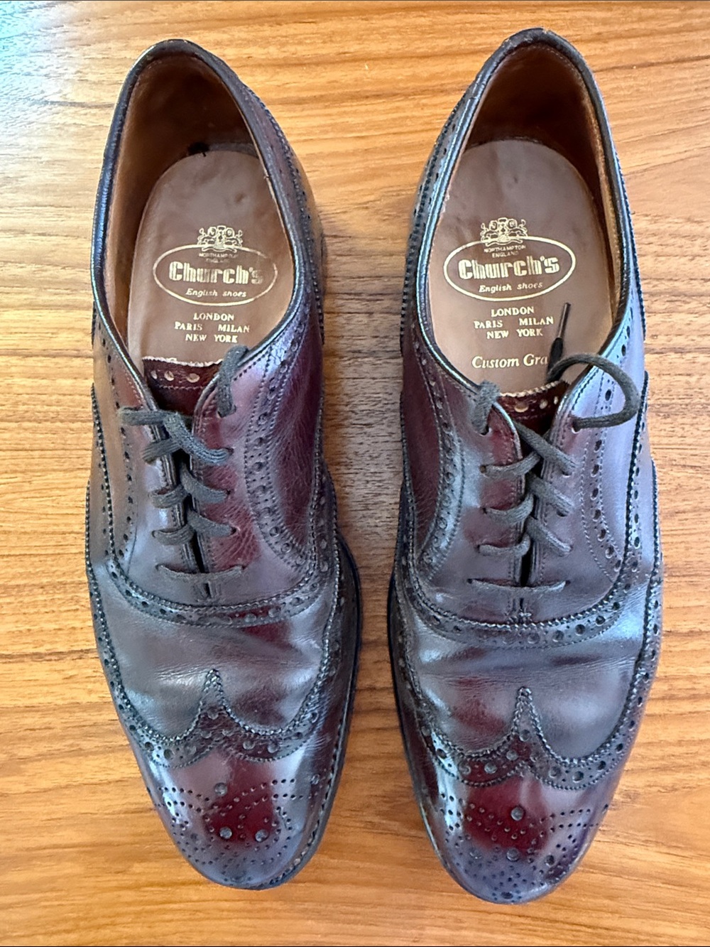Church's Burgundy Burnished Leather Wingtip Oxfords